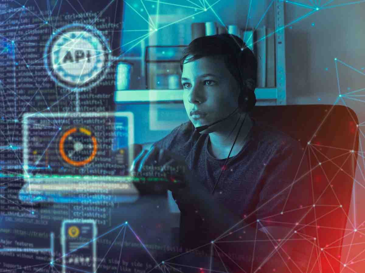 Developer working with API and data connection graphics overlaid on screen
